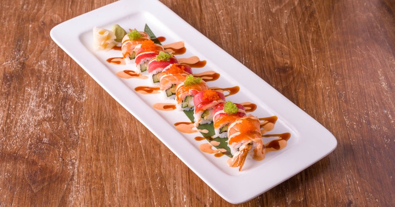 Kamikaze Roll topped with tuna, salmon, tobiko and sauces