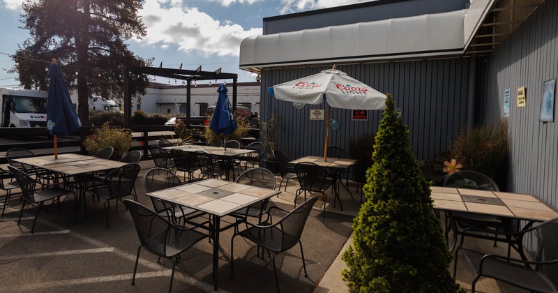 Exterior, patio, tables and chairs, parasols