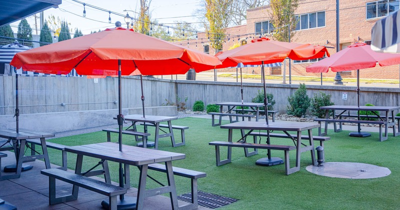 Patio with tables and parasols