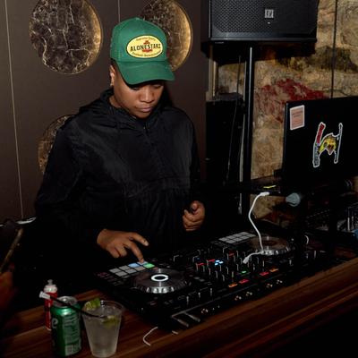 A DJ mixing music.