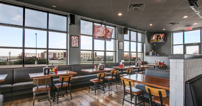 Interior, seating area, dining tables lined up