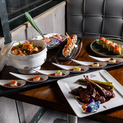 Multiple food dishes displayed on table.