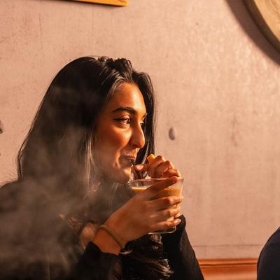 Guest sipping a drink