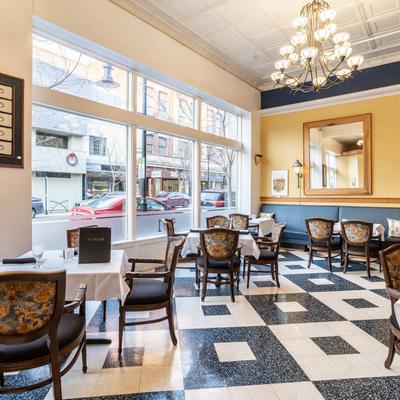 Dining area, tables and chairs, black and white floor tiles