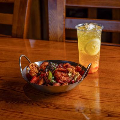 Mala dry pot shrimp meal and a drink.