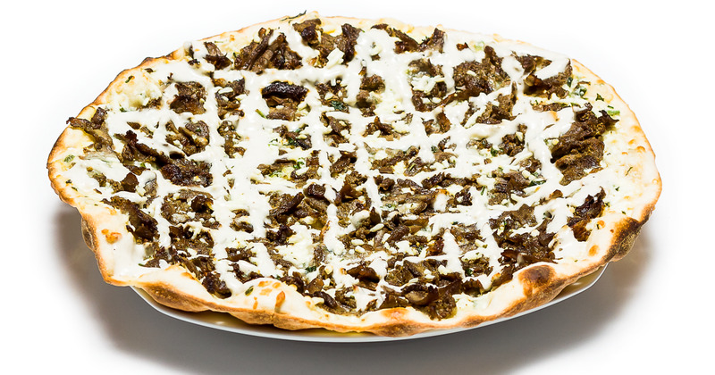 Pizza with extra cheese on top