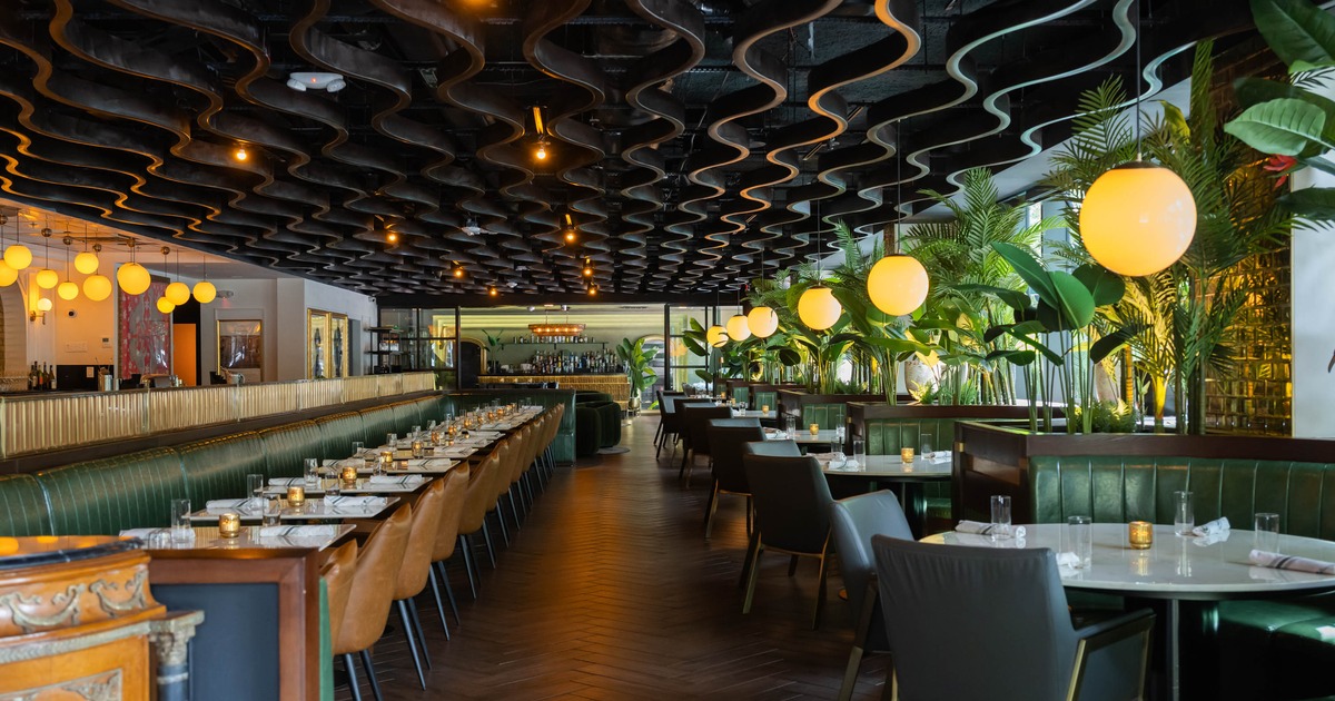 Interior, dining area, banquette seating on the left, seating booths on the right