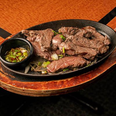 Grilled New York steak,with butter, and Thai dipping sauce.