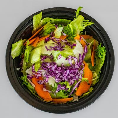 Salad with iceberg lettuce, carrots, and red cabbage.