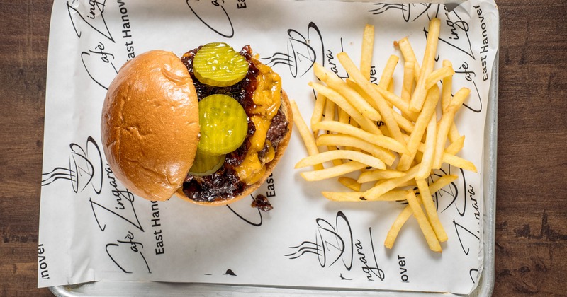 Double cheeseburger with bacon jam, pickles, and fries
