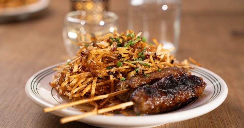 Steak skewers and crispy potatoes