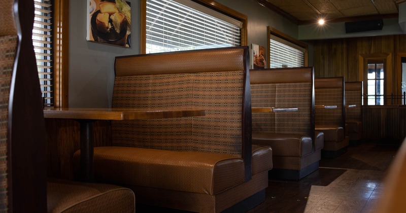 Interior, tables and seating booths ready for guests