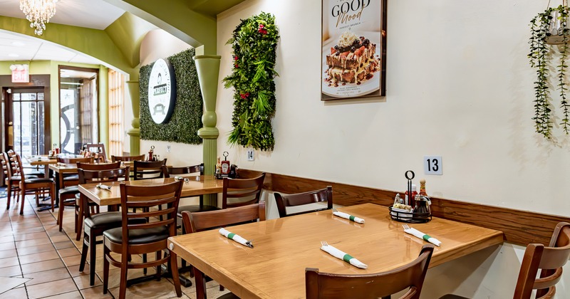 Interior dining area with dining tables along the wall