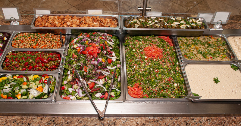 Numerous dishes in buffet line