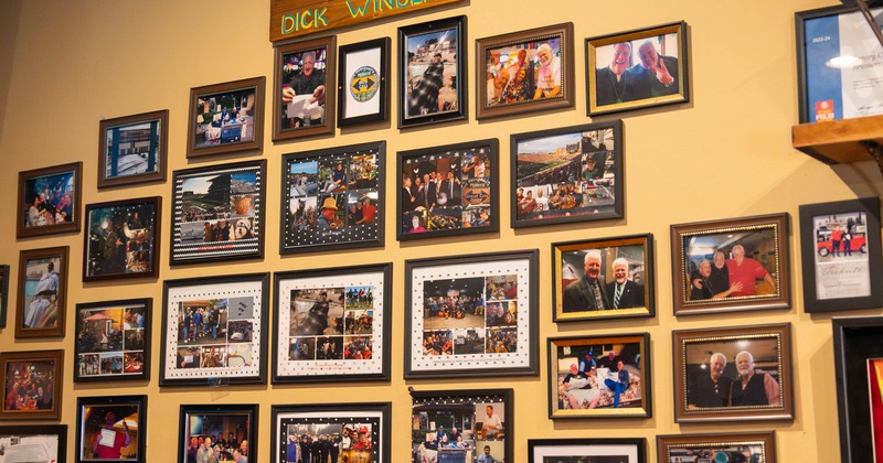 Framed photographs on the wall