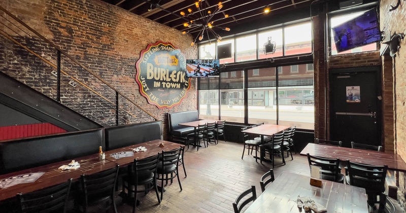 Interior, long banquet seating bench near stairs