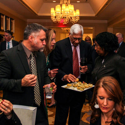 Guests mingling and munching