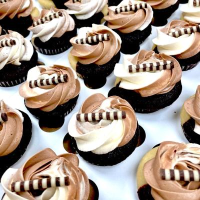 Chocolate cupcakes with creamy frosting.