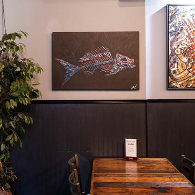 The Art work of Axel Anderson at 13 Tacos & Taps.