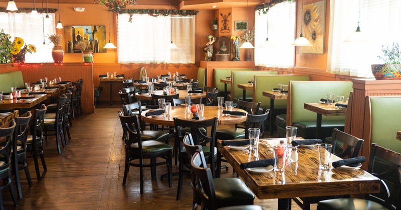 Restaurant interior, dining area with set tables