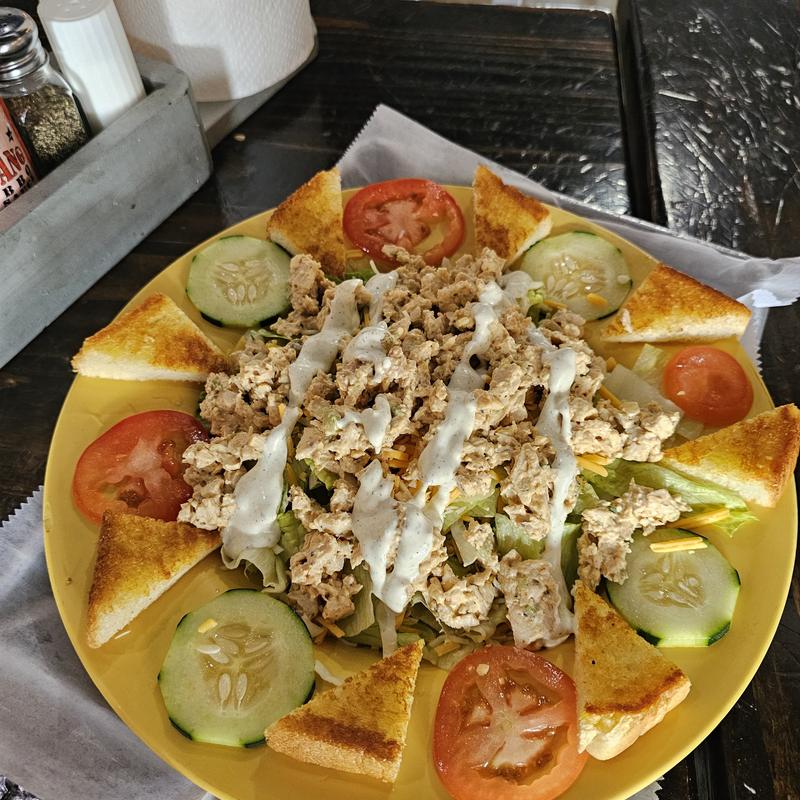 smoked chicken salad on salad photo