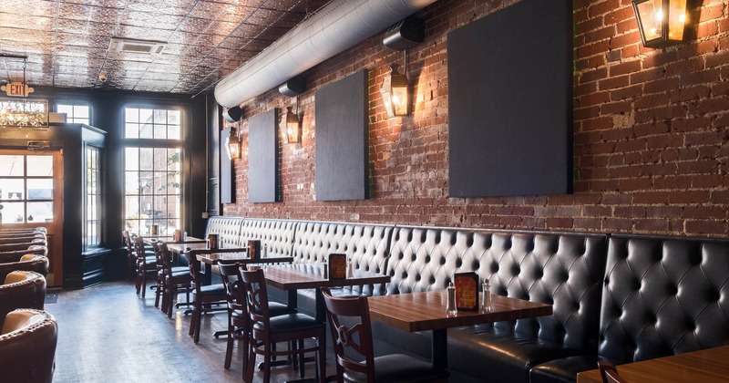 Interior, banquette seating area, tables and chairs