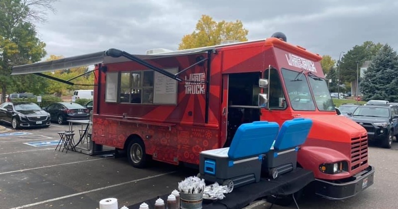 Food truck parked on a parking lot