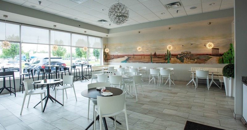 Interior, dining tables by the big windows