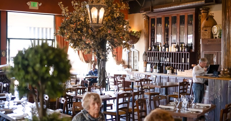 Spacious interior dining area with tables set for guests
