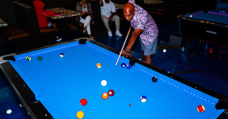 Interior, pool table and player