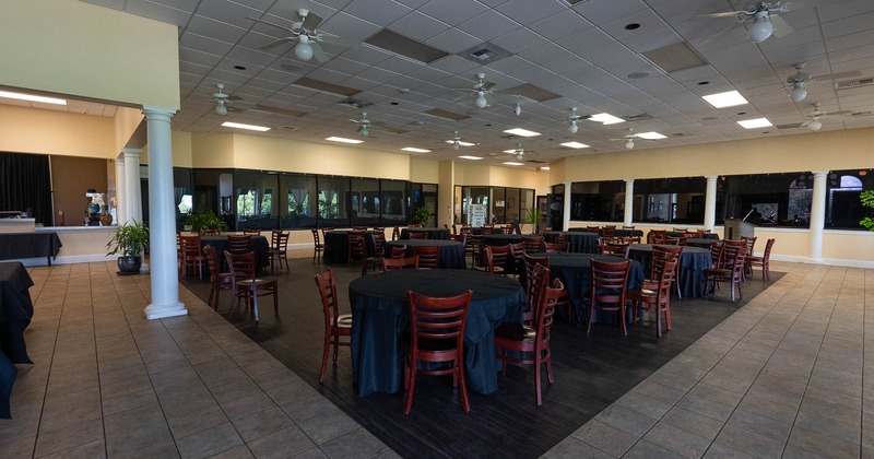 Interior, tables and chairs in dining area