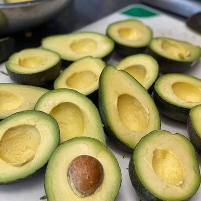 Avocados cut in half.