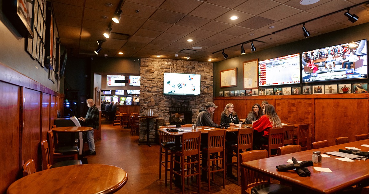 Interior space, dining area, TV sets on the wall