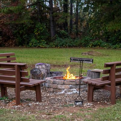 The outside patio, campfire, benches.