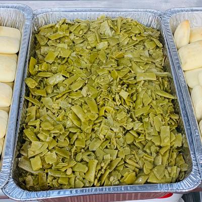 Tray of cooked green beans.