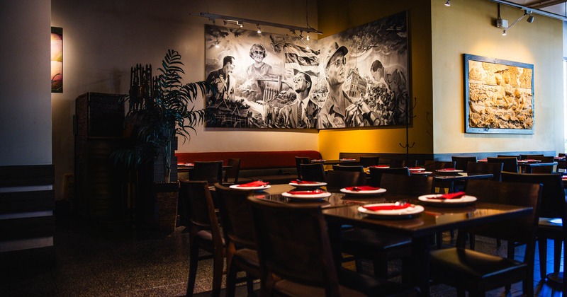 Interior, tables and chairs in dining area