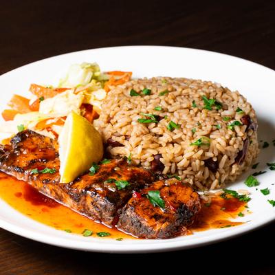 Sweet chili glazed salmon, with rice and salad.