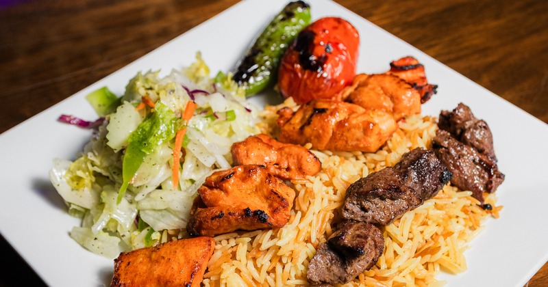 Beef Ribeye adn Chicken Kabob Platter with sides