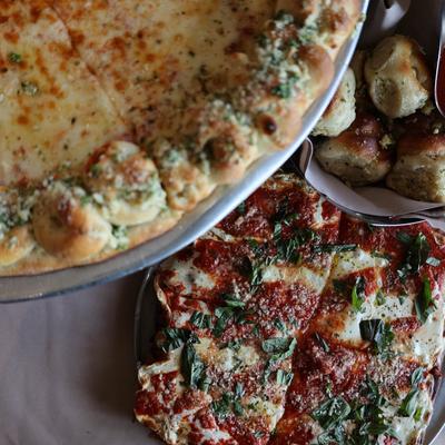 Sweet and Sour Chili Chicken and Margherita pizzas.