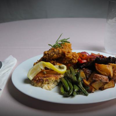 Fried meat with various sides