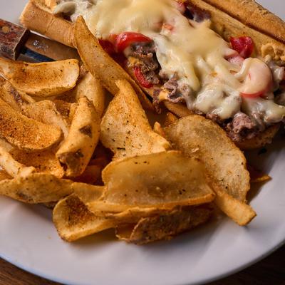 Philly Cheesesteak and chips.