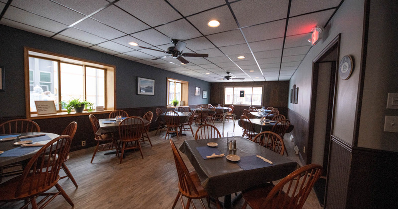 Interior, seating area, tables ready for guests