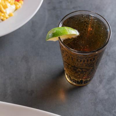 Glass of Corona beer, with lime.