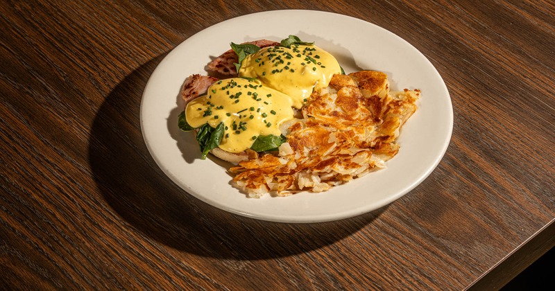 Eggs benedict with ham, top view