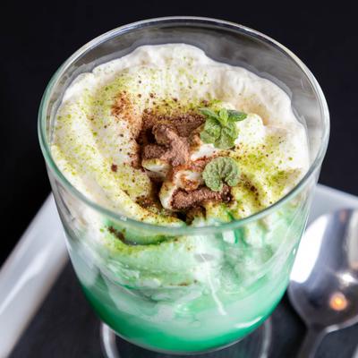 A served ice cream dessert in a cup.