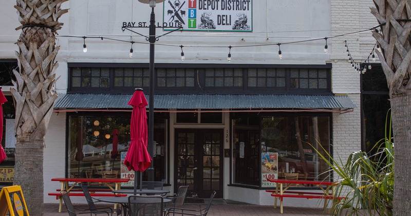 Exterior, entrance, table and chairs in front