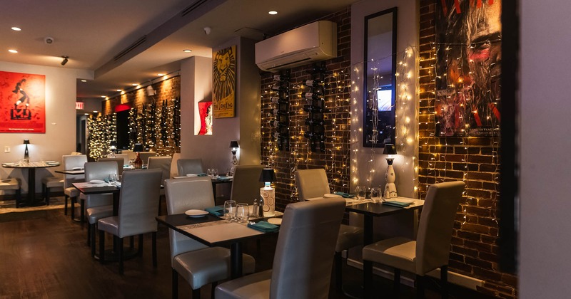 Interior, tables and chairs in dining area