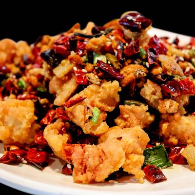 Fried chicken with peppers.