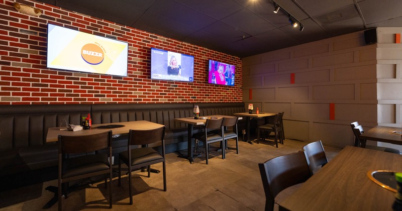 Interior dining area, TVs on the walls