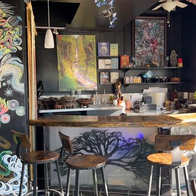 The serving counter with various decorations on shelves.